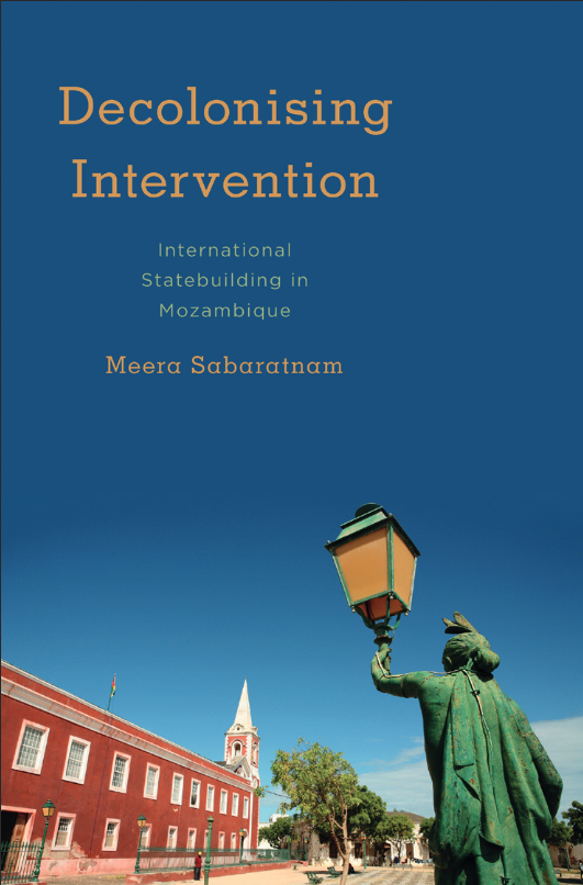 Cover of the book Decolonising Intervention, which features the former Governor's house on Ilha de Moçambique, now a museum, plus a rusting colonial lamp-post