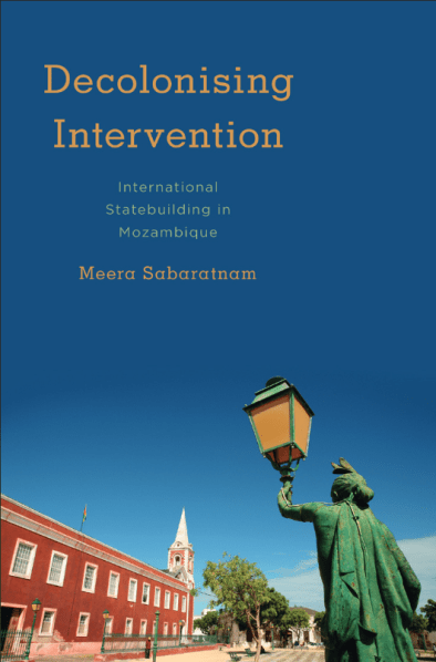 Cover of the book Decolonising Intervention, which features the former Governor's house on Ilha de Moçambique, now a museum, plus a rusting colonial lamp-post